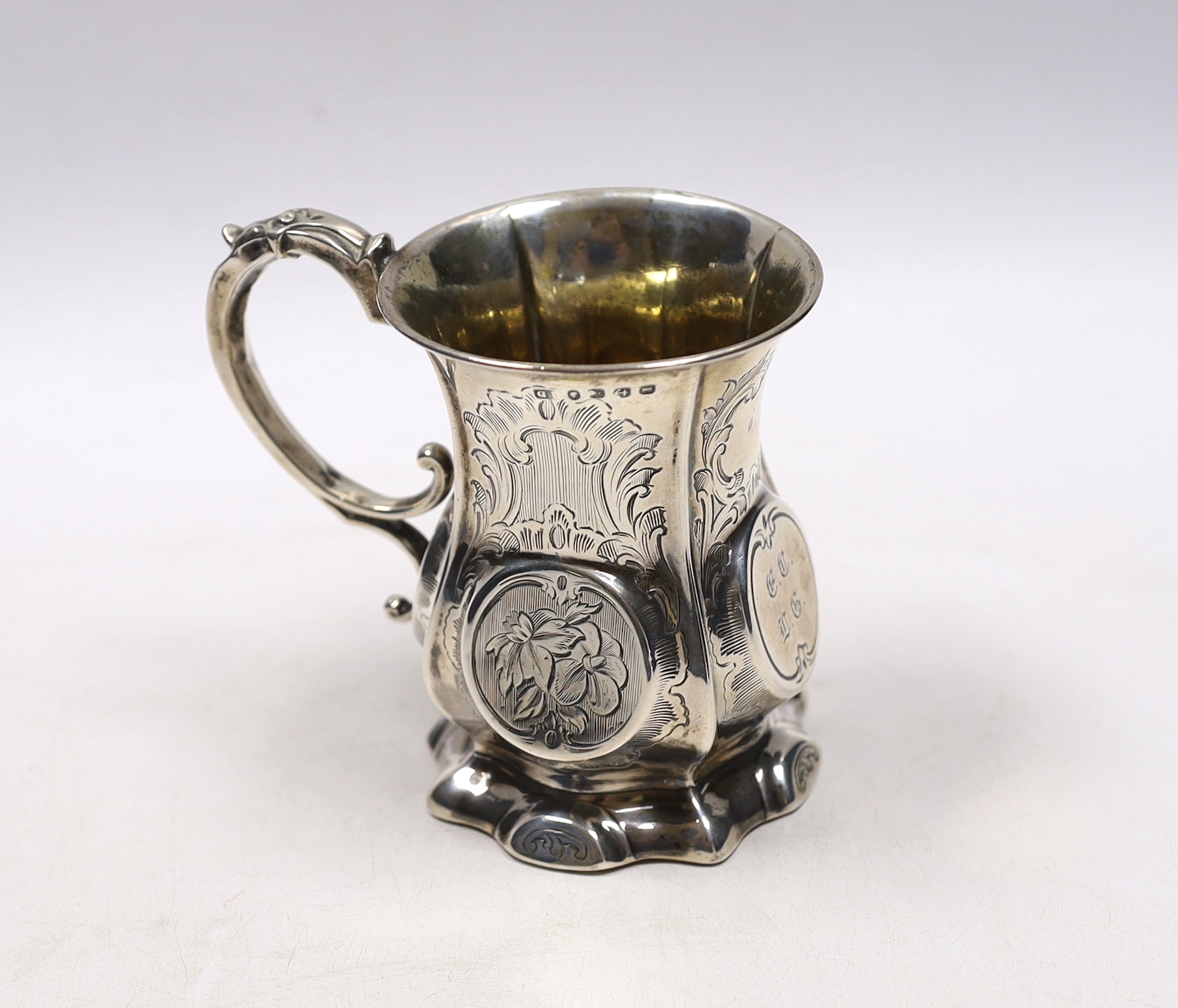 A Victorian engraved silver christening mug, George Unite?, Birmingham, 1857, 10.2cm.